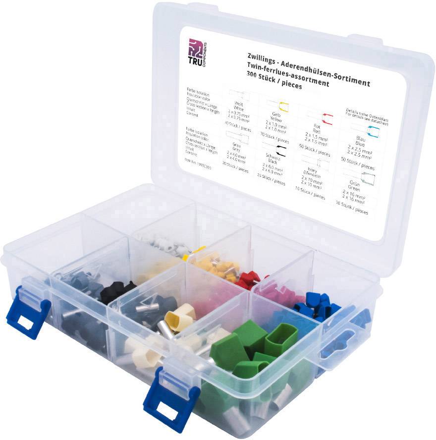 Plastikbox mit verschiedenen farbigen Aderendhülsen in mehreren Fächern. Deckel zeigt eine Beschreibung des Inhalts mit spezifischen Maßen und Mengen.