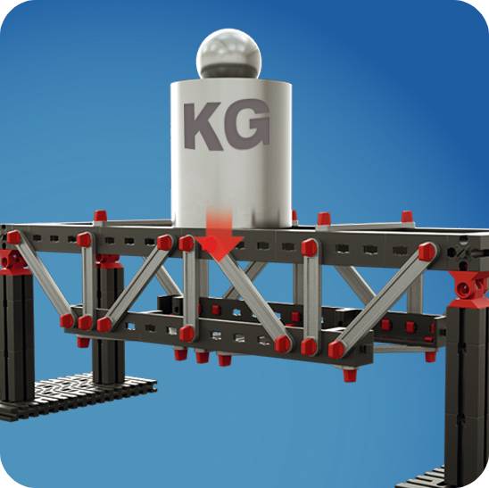 Konstruktion aus Metall- und Kunststoffteilen auf blauem Hintergrund. Eine graue Masse mit 'KG'-Aufdruck zeigt Gewichtsbeschränkung.