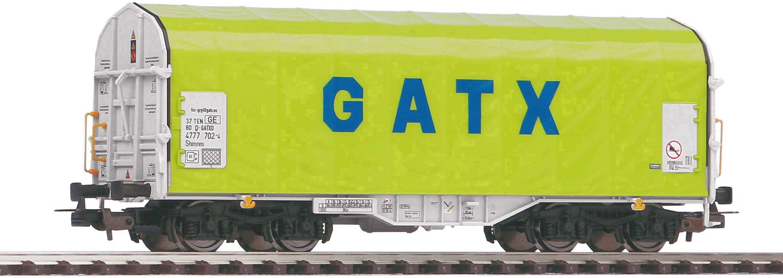 'Eisenbahngüterwagen mit grünem Schutzdach und blauer Aufschrift 