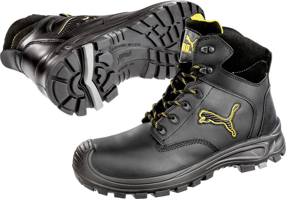 Schwarze, knöchelhohe Arbeitsstiefel mit gelben Details und rutschfester Sohle, geeignet für den Einsatz in der Industrie.
