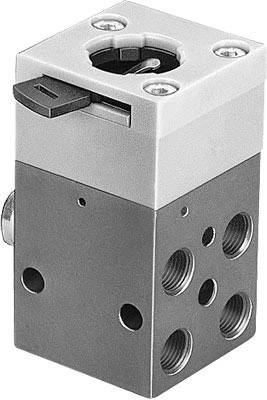 Ein sechseckiges pneumatisches Ventil mit mehreren Anschlüssen und einem seitlichen Hebel zur Steuerung der Luftzufuhr.