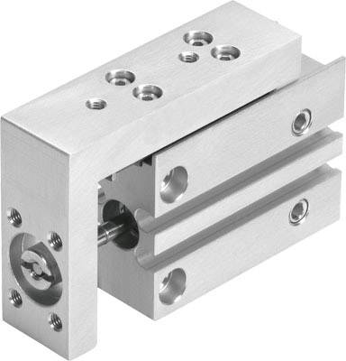 Ein metallisches mechanisches Bauteil mit mehreren Schraubenlöchern und einem beweglichen Schiebemechanismus, vermutlich ein Schlitten.