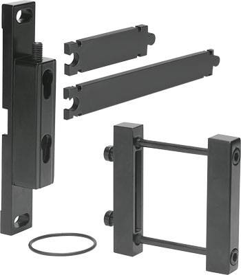 Mehrere schwarze Beschläge und Verbindungselemente aus Metall in verschiedenen Formen und Größen auf weißem Hintergrund.