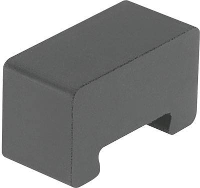 Ein rechteckiger, grauer Kunststoffblock mit einer Aussparung an der Unterseite.