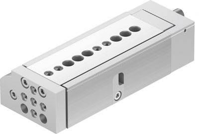 Metallischer pneumatischer Antrieb, rechteckige Form, mit mehreren Anschlussöffnungen an Ober- und Vorderseite. Geeignet für industrielle Anwendungen.