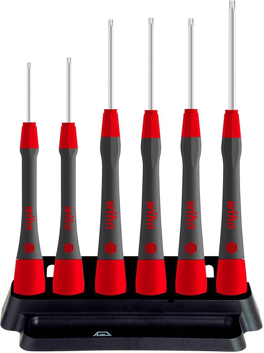 Ein Set von sechs Schraubendrehern in verschiedenen Größen, schwarz-rot, steht auf einem schwarzen Ständer. Geeignet für Präzisionsarbeiten.