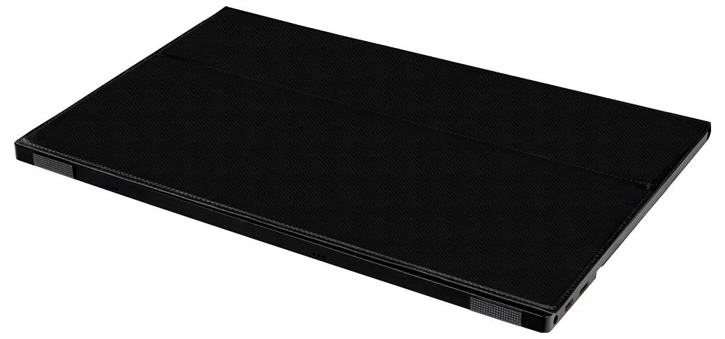 Ein flacher, schwarzer Laptop von oben gesehen, geschlossen. Klarer, minimalistischer Look ohne sichtbares Logo oder Markenkennzeichnung.