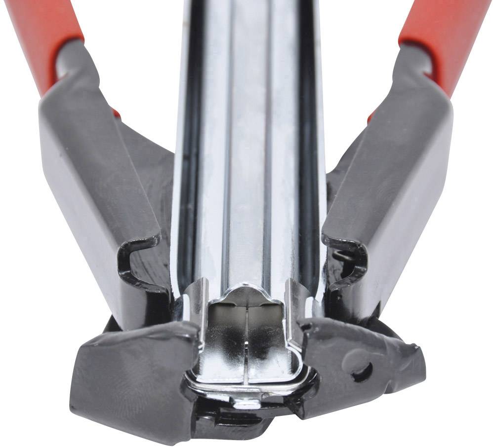 Nahaufnahme einer geöffneten, silbernen Heftzange mit roten Griffen, auf den Mechanismus fokussiert.