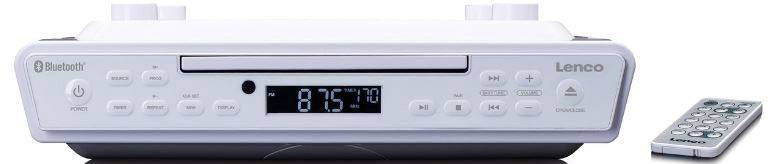 Ein weißes Unterbauradio mit Bluetooth und CD-Player. Es zeigt die Frequenz 87,5 MHz auf dem Display. Eine Fernbedienung liegt daneben.
