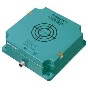 Ein rechteckiger, türkisfarbener Sensor mit Metallstecker und Markierungen auf der Oberseite. Modellnummer und Logos sind sichtbar.