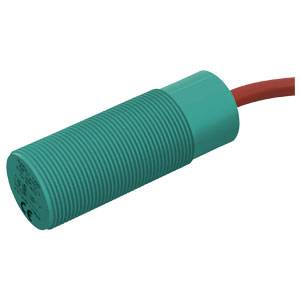 Ein zylindrischer, grüner Sensor mit gerippter Oberfläche und rotem Kabel, typisch für industrielle Anwendungen.