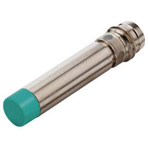 Ein zylindrischer Metallstift mit einer grünen Kappe und einem geriffelten Ende.