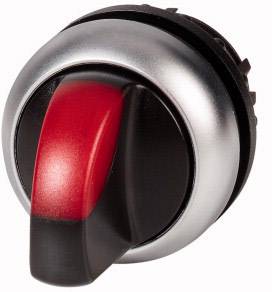 Ein runder, silberner Drehknopf mit einem roten Hebel, der anscheinend zur Bedienung eines Geräts oder einer Maschine verwendet wird.