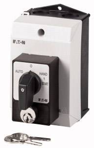 Schalter mit Positionen 'Auto', 'Hand', und 'Aus'. Schlüssel vorne abgebildet zeigt Steuerung und Sicherung von Geräten.