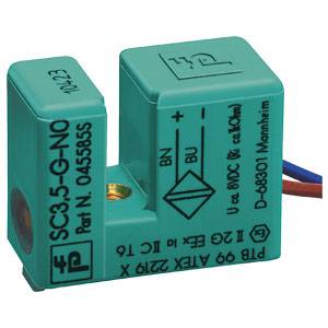 Ein grüner elektronischer Sensorbaustein mit Modellnummer SC3.5-G-NO, hergestellt in Mannheim. Enthält mehrere Kabelanschlüsse.