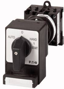 Schalter mit drei Einstellungen: 'AUTO', 'HAND', '0'. Schalter auf 'AUTO', rechts ein Hebel zum Starten. Gerät von Eaton.