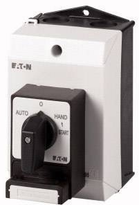 Ein weißer und schwarzer Motorschalter von Eaton mit den Einstellungen 'Auto', 'Hand' und 'Start'.