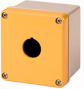 Gelbes Gehäuse mit schwarzem, rundem Loch in der Mitte, umgeben von vier Schrauben in den Ecken.