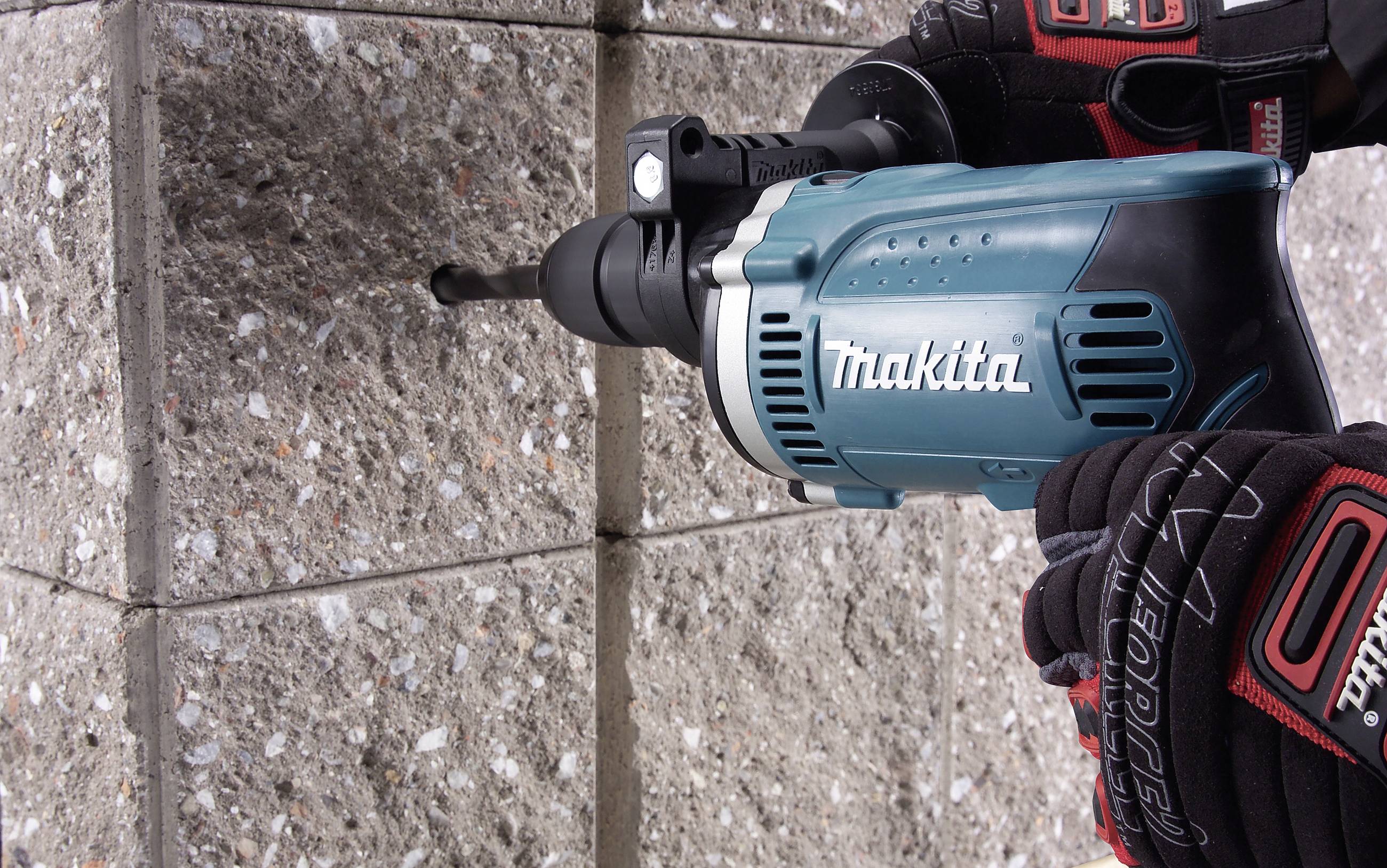 Makita HP1631KX3 1-Gang-Schlagbohrmaschine 710W mit Zubehör, inkl. Koffer