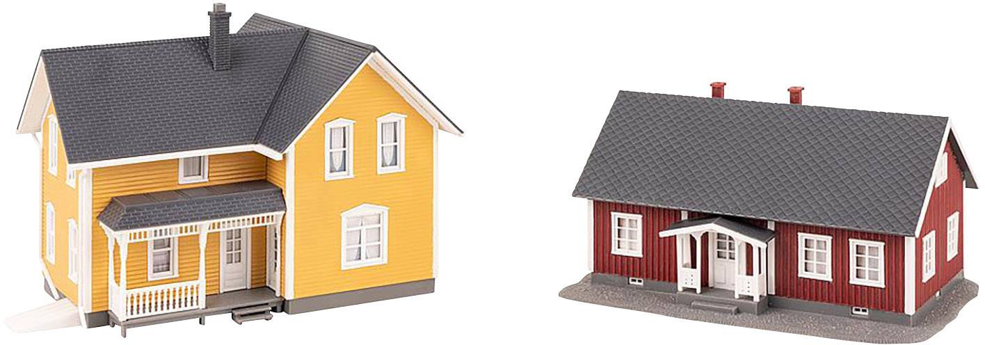 Zwei Modelle von Häusern: links ein gelbes zweistöckiges Haus mit Veranda, rechts ein rotes einstöckiges Haus. Beide haben schwarze Dächer.