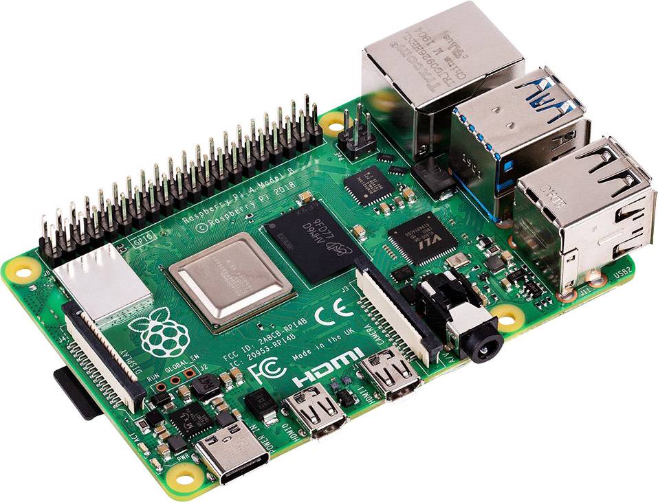Ein Raspberry Pi 4 Einplatinencomputer mit Anschlüssen für HDMI, USB, Ethernet und GPIO, auf einer weißen Oberfläche liegend.