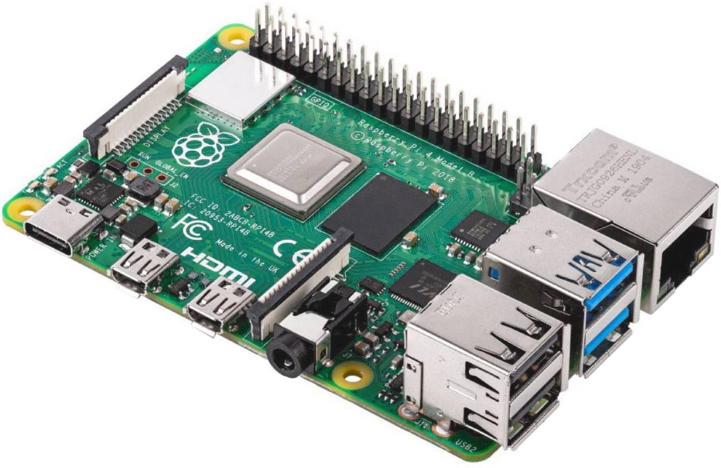 Ein Raspberry Pi Einplatinencomputer mit mehreren Anschlüssen, einschließlich USB, HDMI und Ethernet, und sichtbarem Prozessor.