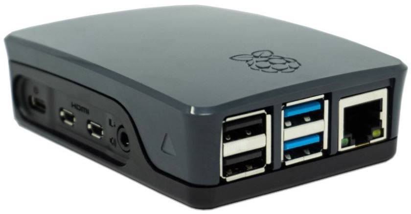 Ein schwarzes Gehäuse für einen Einplatinencomputer mit mehreren USB- und Netzwerkanschlüssen, daneben HDMI- und Audiobuchsen.