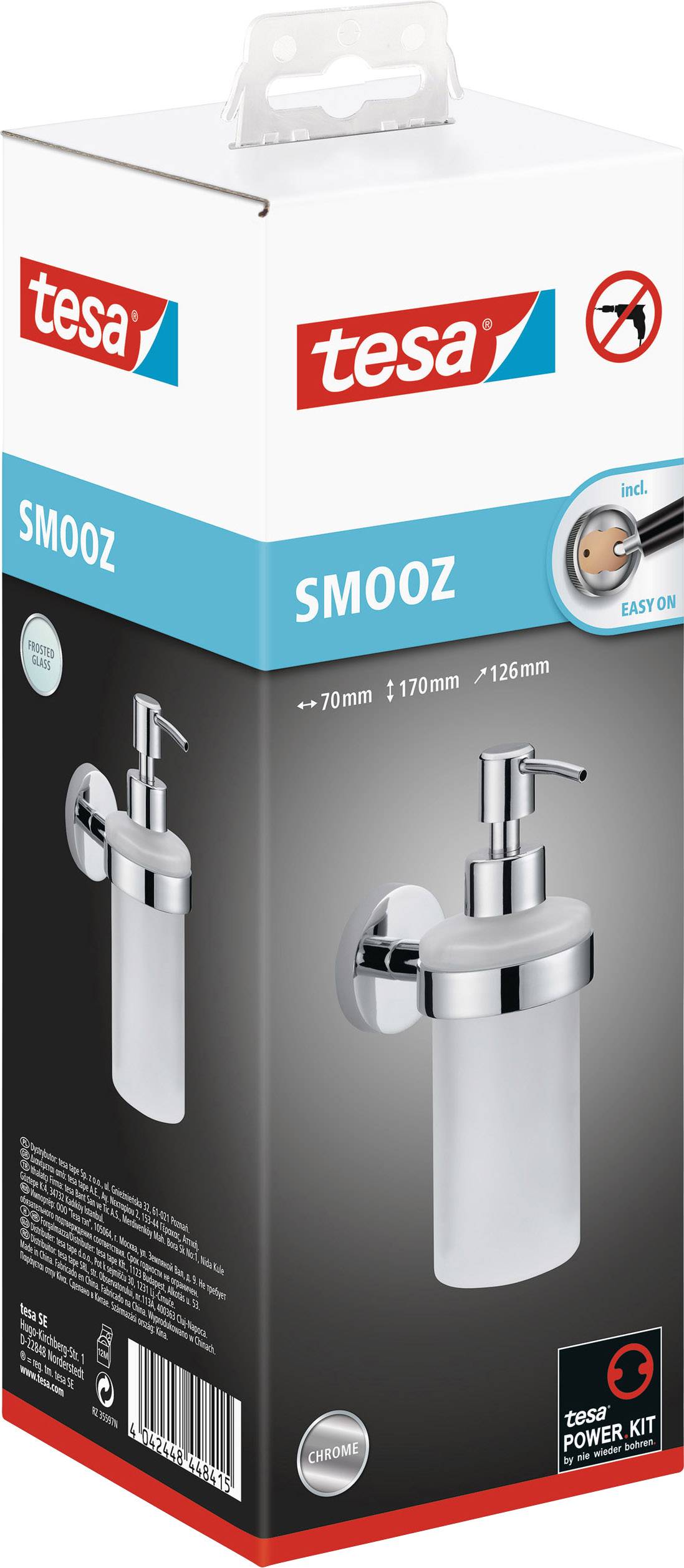 Verpackung eines Tesa 'Smooz' Seifenspenders mit Wandhalterung, abgebildet inkl. Montagematerial. Hochglanz-Chrom-Design, 70 mm Ø, 179 mm H.