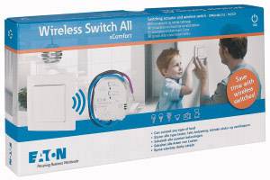 'Wireless Switch All xComfort' - Verpackung mit einem drahtlosen Schalterset. Aufdruck zeigt kompatible Geräte und eine Abbildung der Installation.