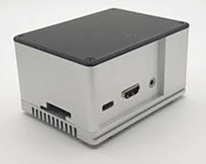 Ein rechteckiges, graues elektronisches Gerät mit Anschlüssen auf der Seite. Möglicherweise ein Mini-Computer oder Adapter.