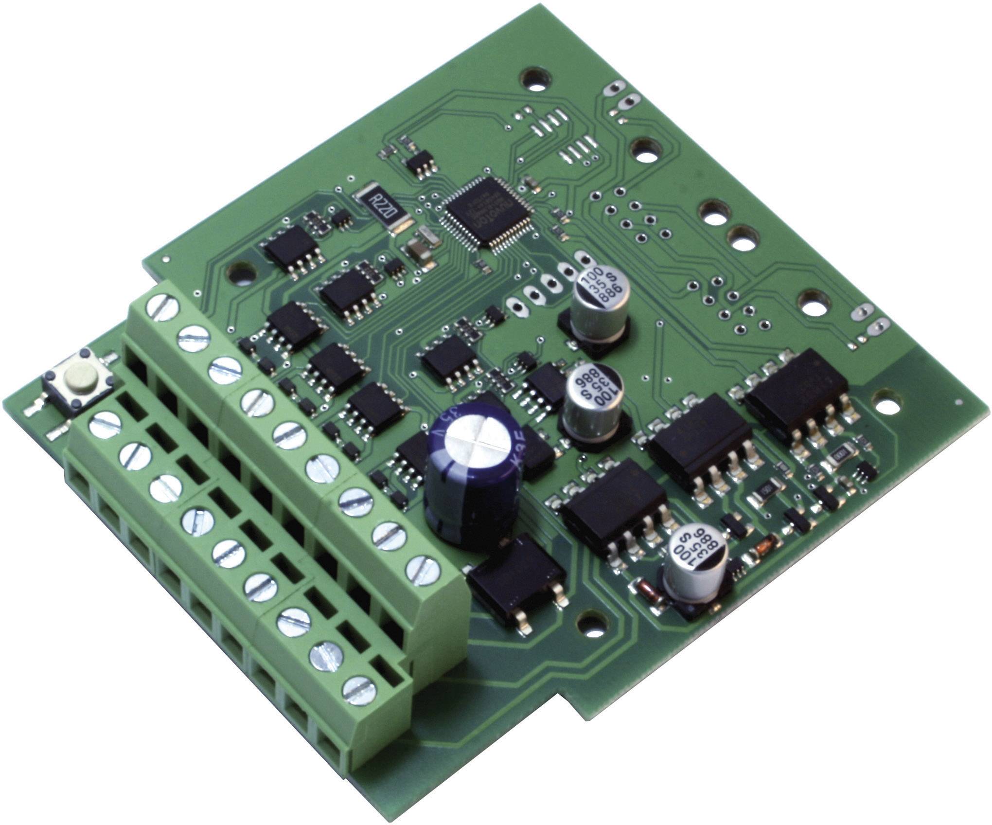Eine grüne elektronische Platine mit mehreren integrierten Schaltkreisen, Kondensatoren und Widerständen, zeigt Komponenten einer Steuerplatine.