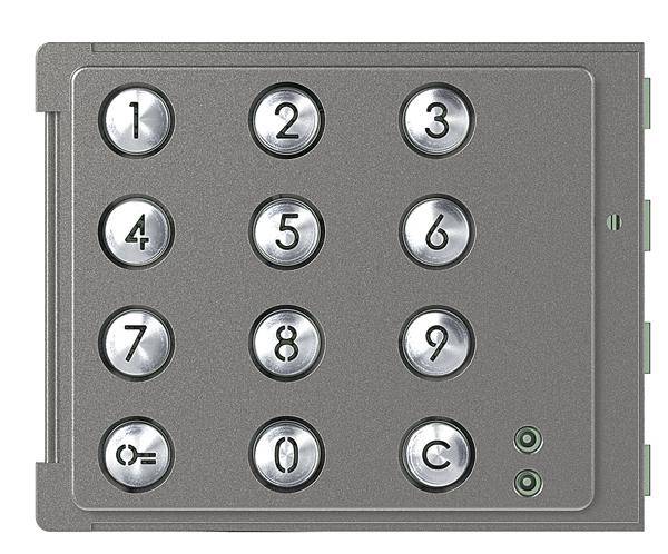 Tastaturfeld mit zwölf silbernen Tasten, nummeriert von 1 bis 9, sowie Tasten für Stern, Null und C, auf grauem Hintergrund.