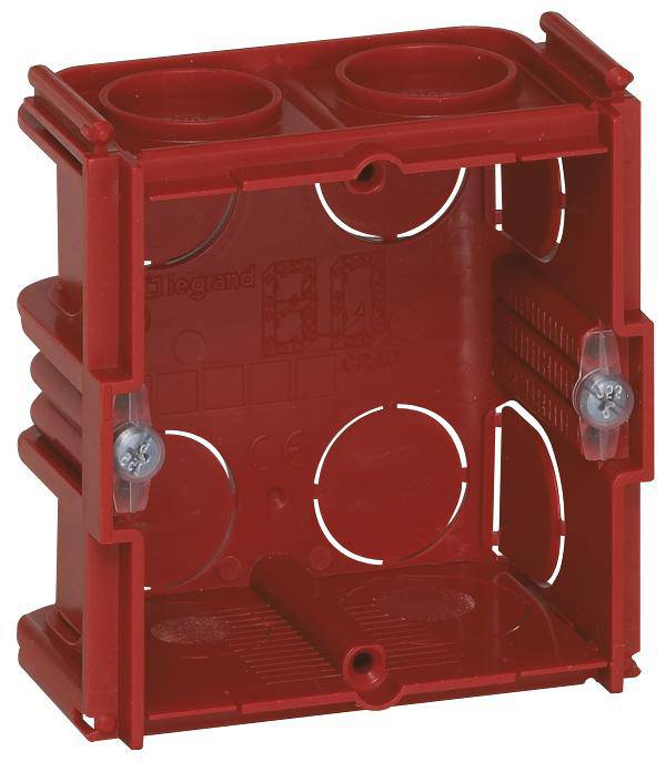 Rote Unterputzdose aus Kunststoff mit zwei seitlichen Schrauben. Sie wird für die Installation von elektrischen Schaltern verwendet.