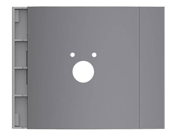 Eine graue Metallplatte mit runden Ausschnitten in der Mitte, die an ein stilisiertes Gesicht erinnern. Links sind eingebettete rechteckige Elemente sichtbar.