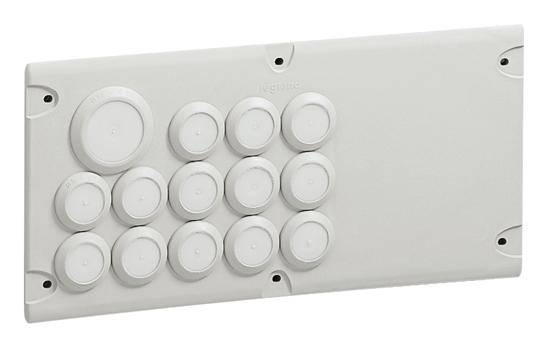 Ein rechteckiges, weißes Kunststofffeld mit mehreren runden Erhebungen in verschiedenen Größen, die symmetrisch angeordnet sind.