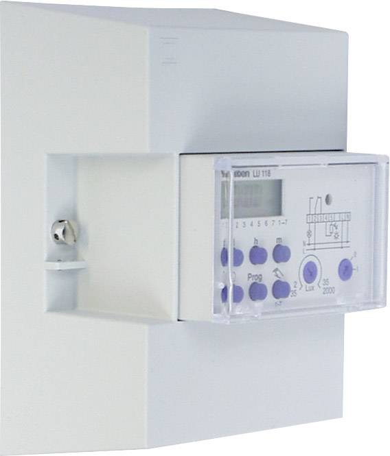 Ein elektronischer Zeitschaltuhr mit mehreren blauen Tasten und einem Display, montiert an einer Wand.
