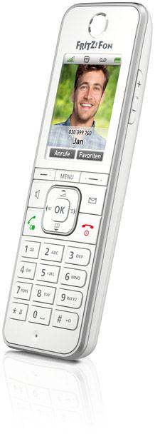 Schnurloses Telefon mit Display zeigt ein Foto einer Person, darunter der Name 'Jan' und die Optionen 'Anrufe' und 'Favoriten'.