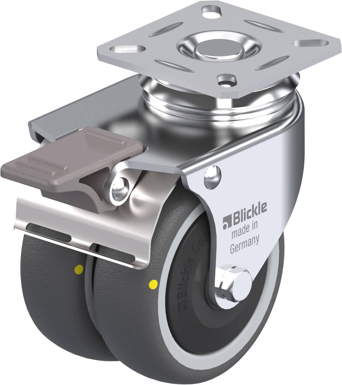 Industrie-Lenkrolle mit Doppelachse aus Metall und Gummi, Aufschrift 'made in Germany', graue Bremse an der Seite.