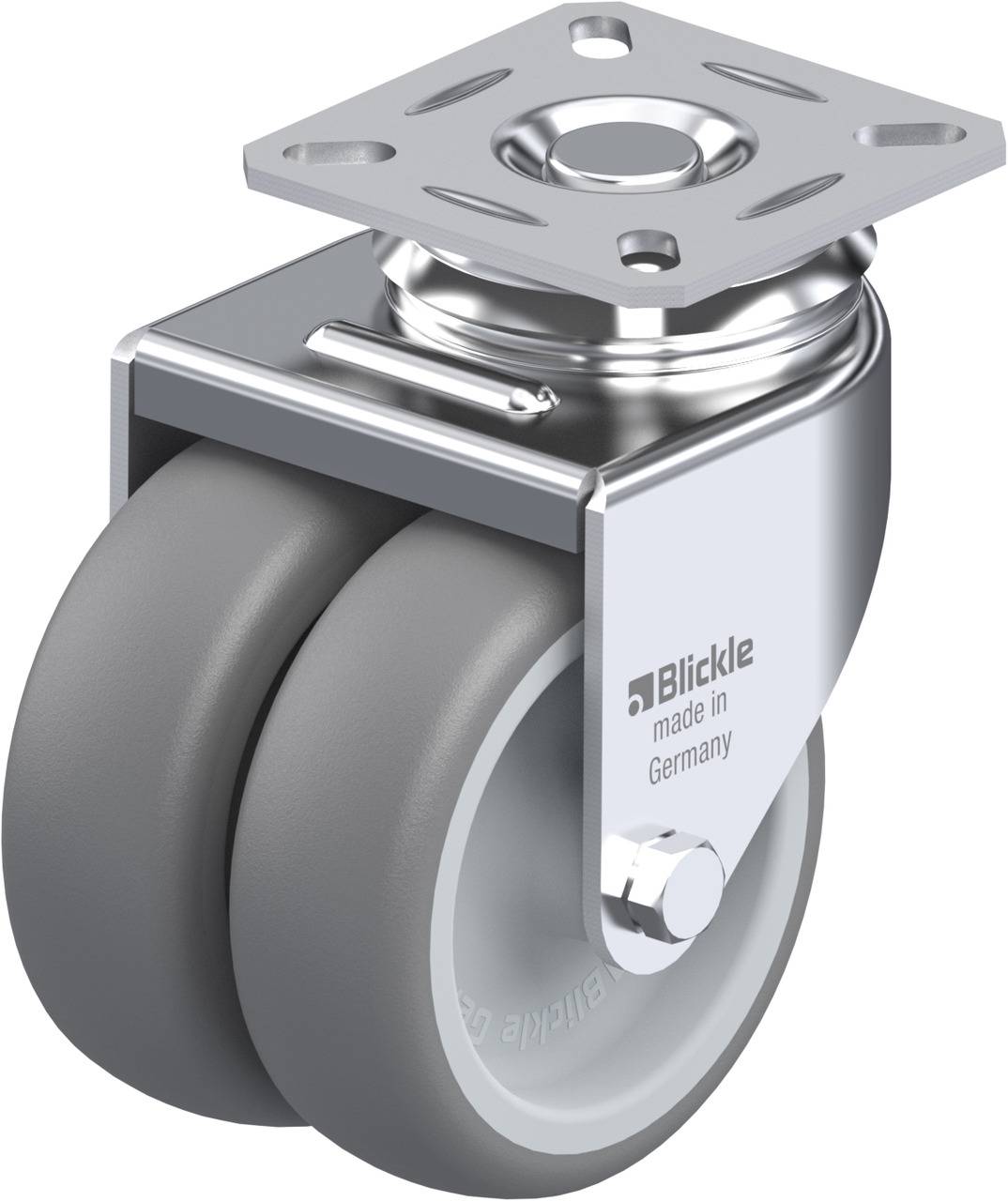 Doppelrolle aus Metall mit grauen Gummirädern und Montageplatte. Aufschrift 'Blickle made in Germany', geeignet für Möbel oder Wagen.