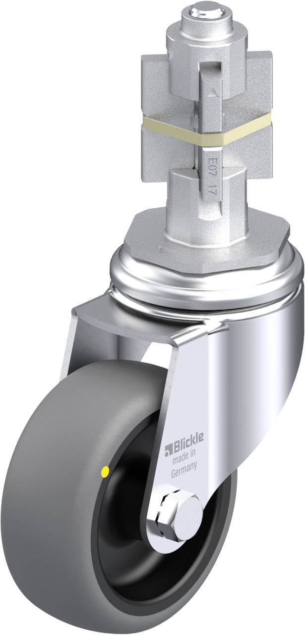 Grau-schwarzes Lenkrollenrad mit silberner Halterung, Drehgelenk oben und gelbem Punkt an der Seite. Text auf der Halterung: 'Blickle Made in Germany'.