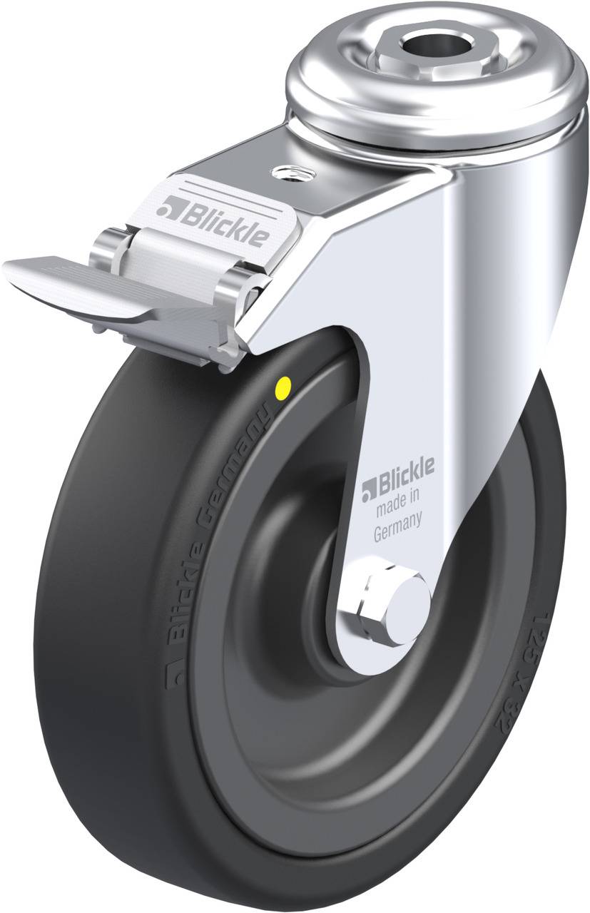 Industrie-Lenkrolle aus Metall mit schwarzem Rad, seitlichem Bremspedal und Aufschrift 'Blickle made in Germany'.
