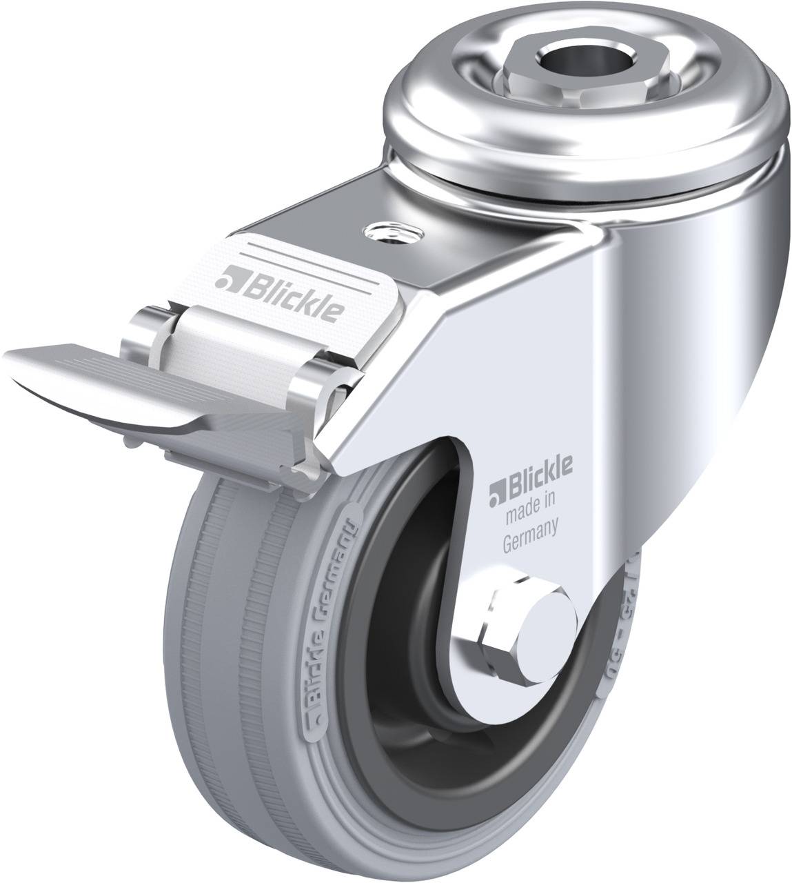 Metallenes Schwerlastlenkrollenrad mit grauem Gummireifen und Befestigungsplatte. Aufschrift 'Blickle made in Germany'.