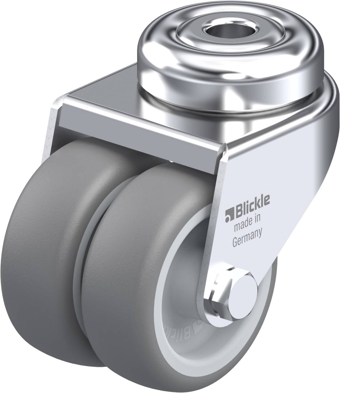 Zwillingsrolle aus Metall mit grauen Gummirädern, Beschriftung 'Blickle made in Germany'. Einsatz in Möbeln oder Industrie.