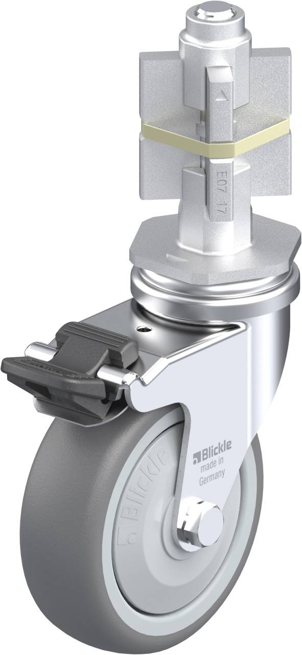 Lenkrolle mit grauem Rad und schwarzem Stoppmechanismus, geeignet für schwere Lasten, montiert auf silbernem Befestigungselement.