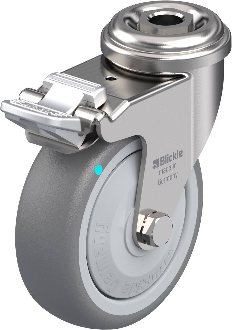 Graues Lenkrollenrad mit Metallgehäuse, Bremse vorne; seitlich 'Blickle made in Germany' graviert.
