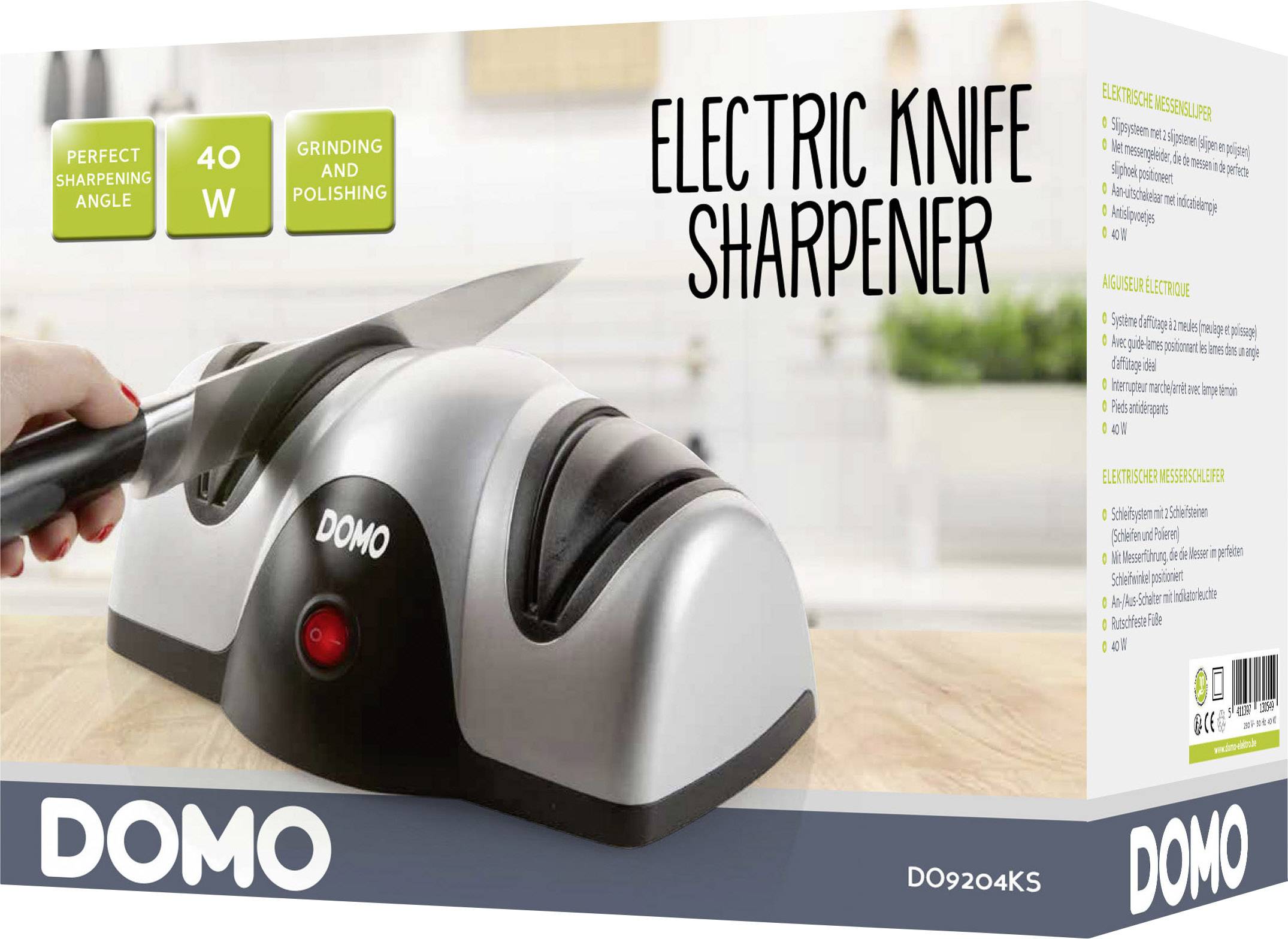 Packung eines elektrischen Messerschärfers mit Hand, die ein Messer haltend über das Gerät bewegt. Text: 'Perfect Sharpening Angle', '40 W'. Markenname: 'DOMO'.