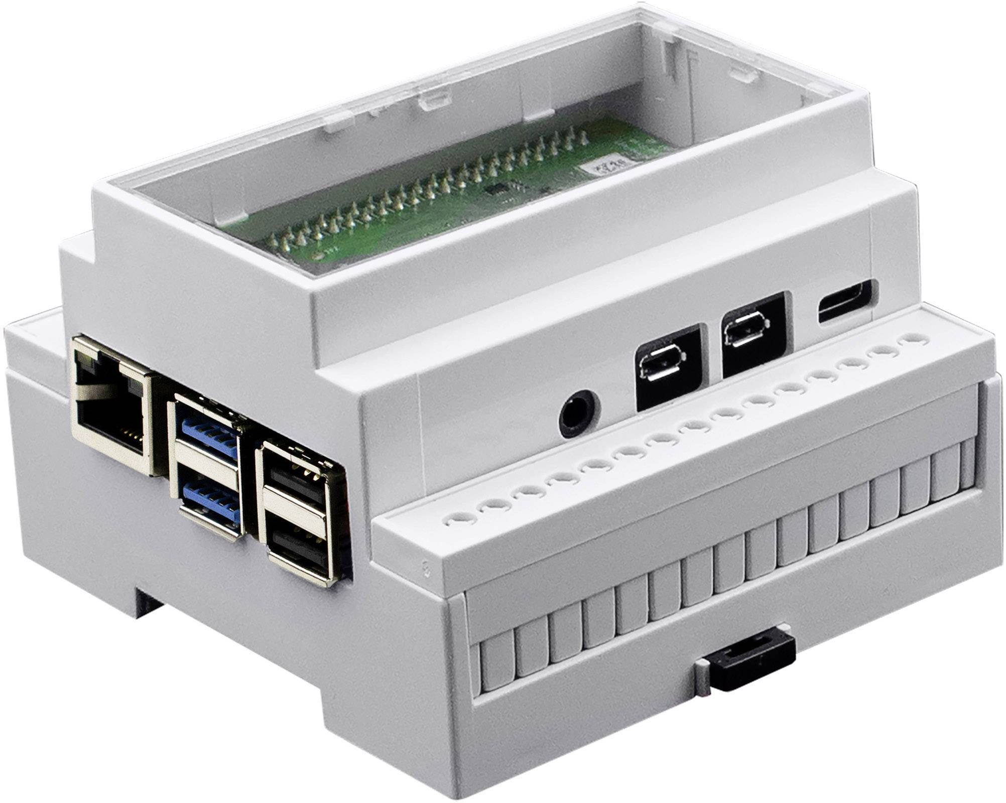 Ein elektrisches Gerät im Gehäuse mit mehreren USB-Anschlüssen und einem offenen Bereich oben für eine Platine.