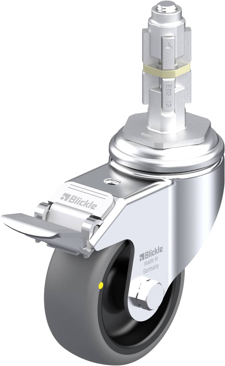 Ein graues Rad mit Metallgehäuse und einer Metallstange oben. Es hat eine Bremse und ist für Möbel oder Geräte geeignet.