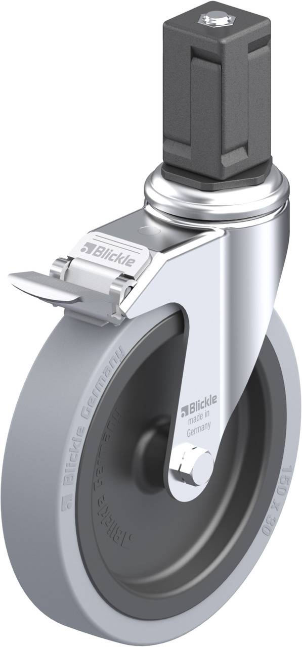 Eine graue Industrielenkrolle mit Bremse und schwarzem Metallgehäuse. Die Rolle ist aus Kunststoff, die Halterung aus Metall.