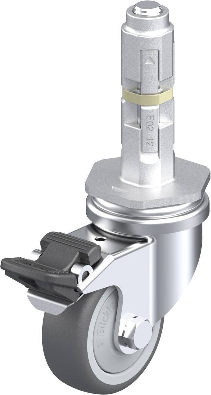 Schwenkrolle aus Metall mit grauem Rad und Bremse, geeignet für industrielle Anwendungen.